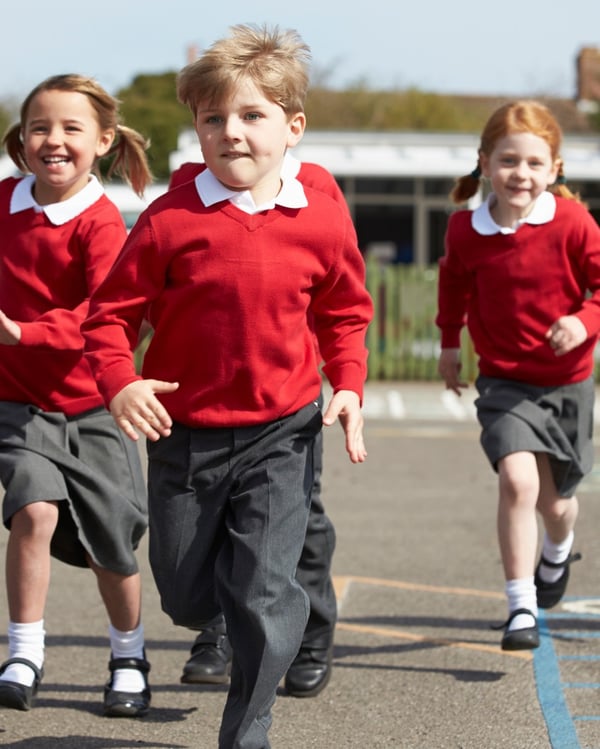 school kids running - uniform